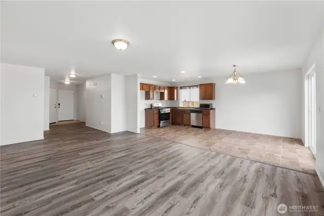 Large living room opens up to dining room and kitchen
