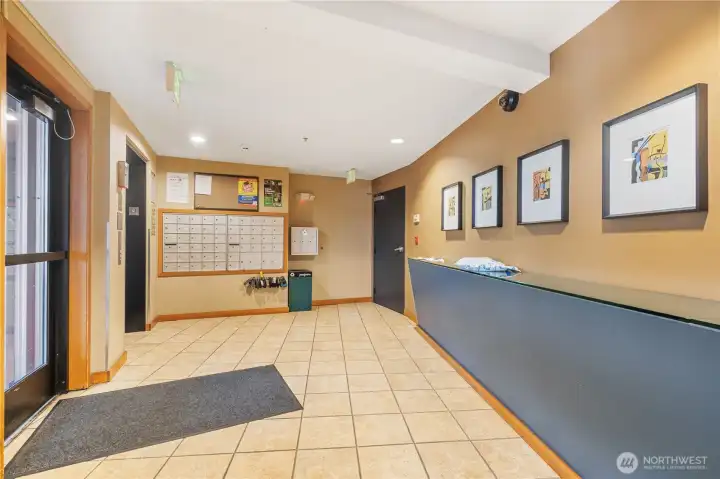 Welcoming building lobby with convenient mailboxes for easy access