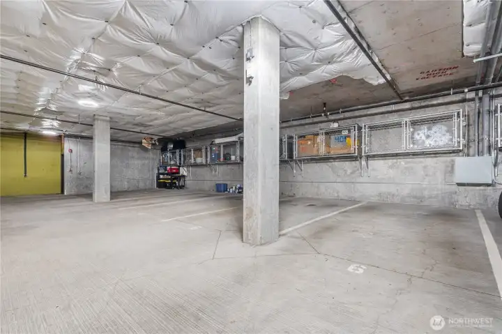Covered garage parking with additional storage space conveniently located above your spot