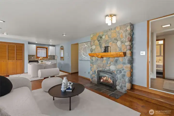 Downstairs Family Room w/ River Stone Fireplace