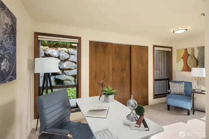 The third main-level bedroom offers two large closets, including one with washer and dryer hookups (not shown).