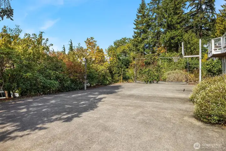 The front sports court adds versatility and can easily double as additional parking.