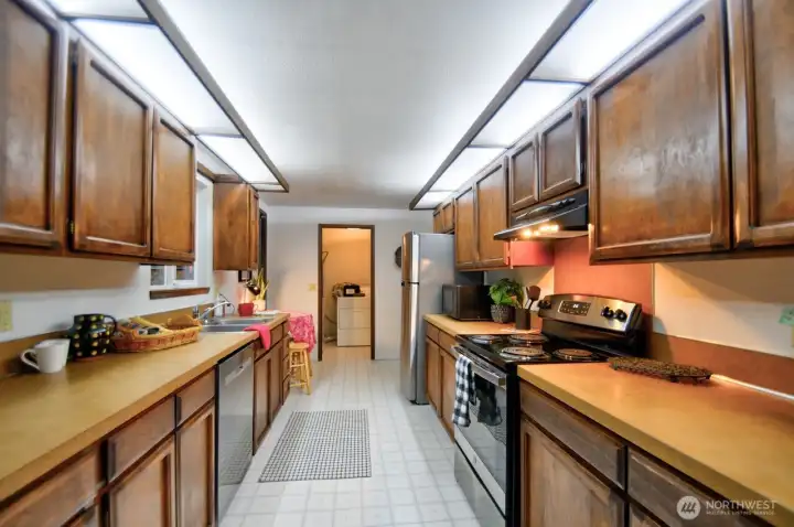 Large, bright kitchen with updated appliances.