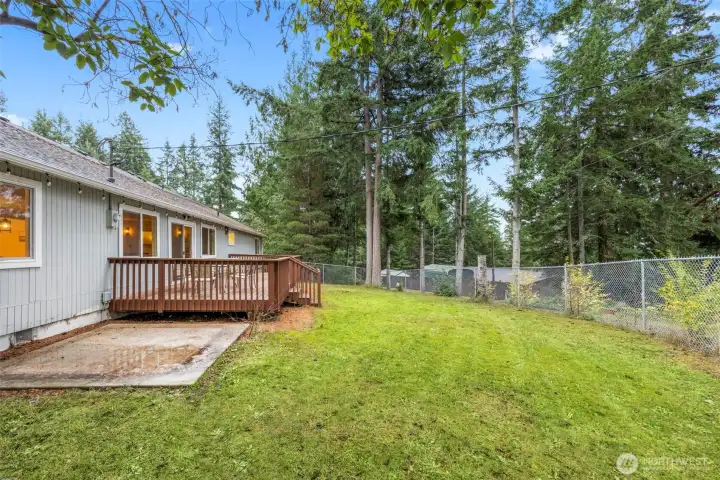 Fully fenced backyard with slab for potential spa