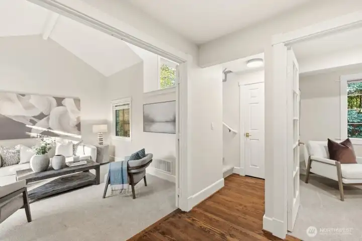 Inviting entryway with large double doors