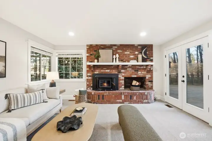 Generous living area with cozy fireplace for crispy evenings