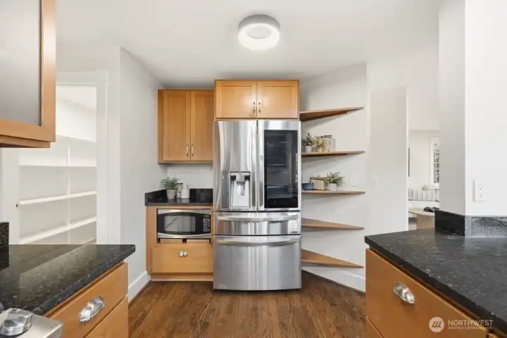 Well laid out kitchen with additional storage