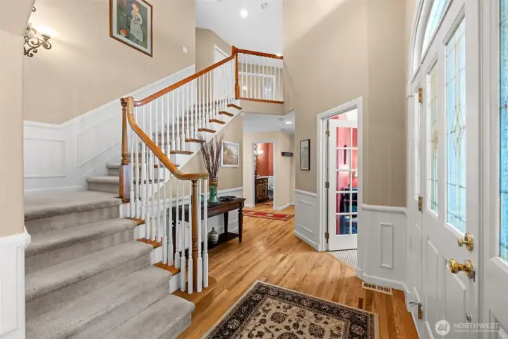 Grand entry with soaring ceiling.
