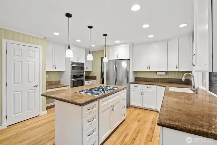 Newly updated kitchen cabinets with soft-close doors.