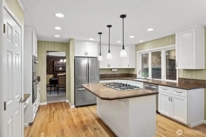 Kitchen bar for additional  eating space.