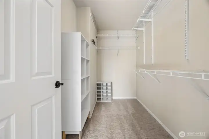 Primary walk-in closet.