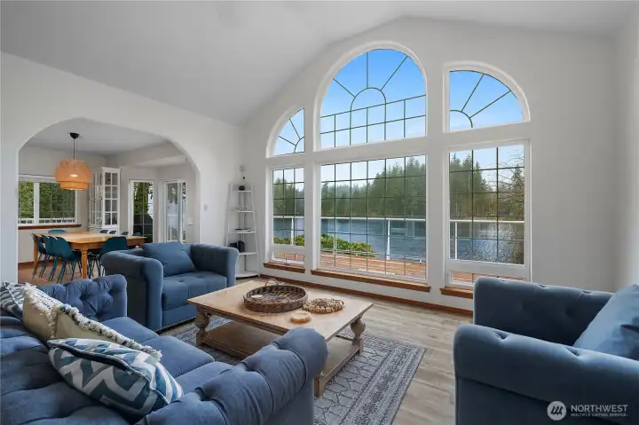 Huge windows greet you from the entryway and are a perfect gathering backdrop.