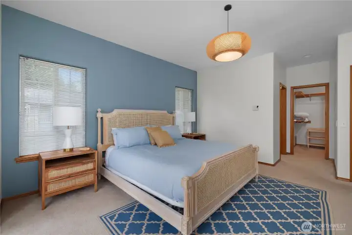 Primary suite looking to walk-in closet.