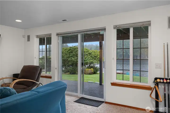 Patio doors lead you to the beach.