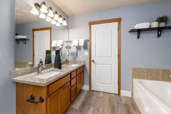 Primary bedroom on 3rd floor with ensuite 5-piece bath and walk-in closet