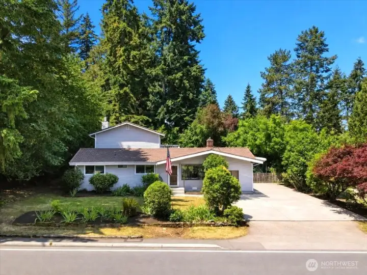 Spacious 4 bedroom, 3 bath home on a gorgeous flat lot in desirable Kenmore.