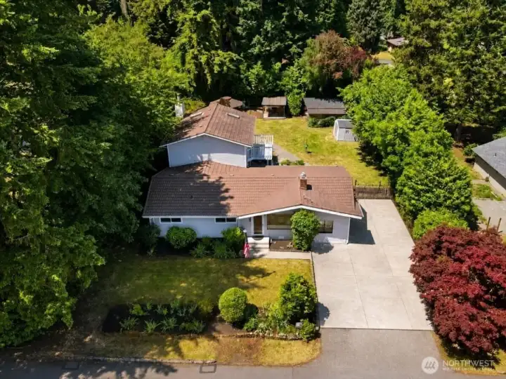 Home features a spacious primary suite as well as a den/office.