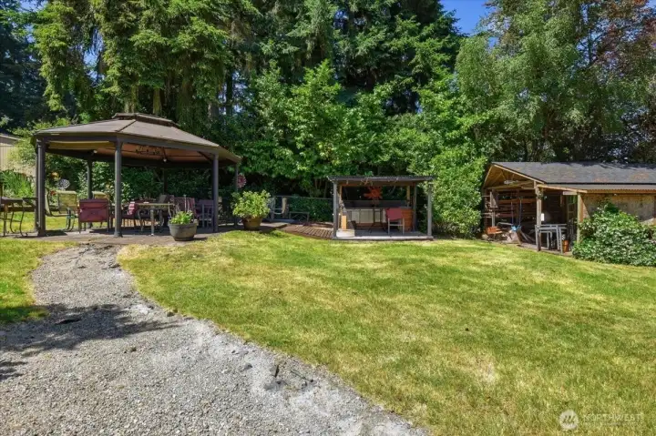 There is a large gazebo and outdoor kitchen.