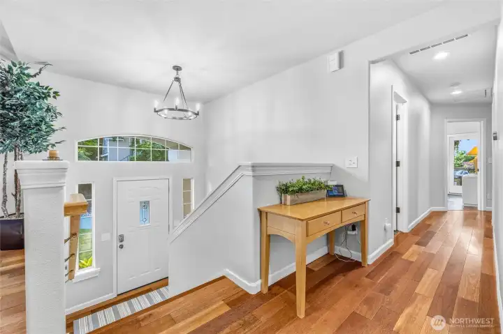 Welcoming foyer with elegant finishes and plenty of natural light. Welcoming foyer with elegant finishes and plenty of natural light.