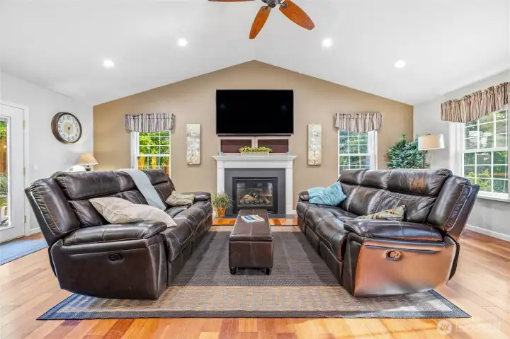 Vaulted ceilings and a cozy fireplace create the perfect gathering space. Vaulted ceilings and a cozy fireplace create the perfect gathering space.