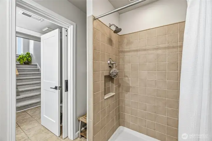 Beautifully finished bath with a tiled shower surround. Beautifully finished bath with a tiled shower surround.