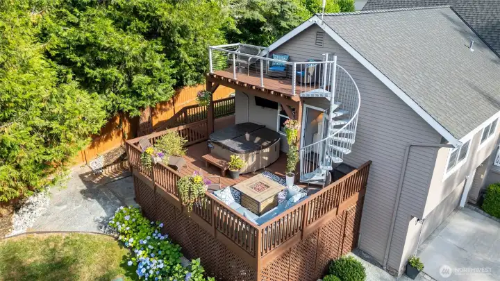 Multi-level deck offers a hot tub and inviting outdoor living space. Multi-level deck offers a hot tub and inviting outdoor living space.