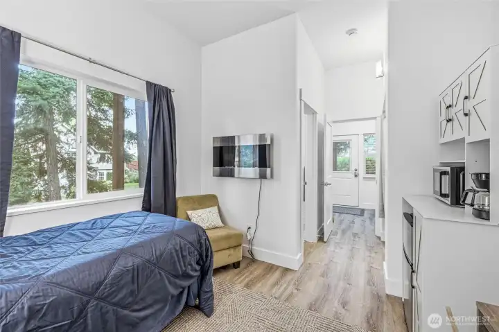 Comfortable guest suite with kitchenette and contemporary finishes. Comfortable guest suite with kitchenette and contemporary finishes.