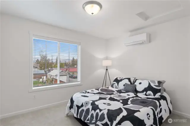 Nice sized bedroom with mini-split to individually control heat and air conditioning. This is a queen sized bed.