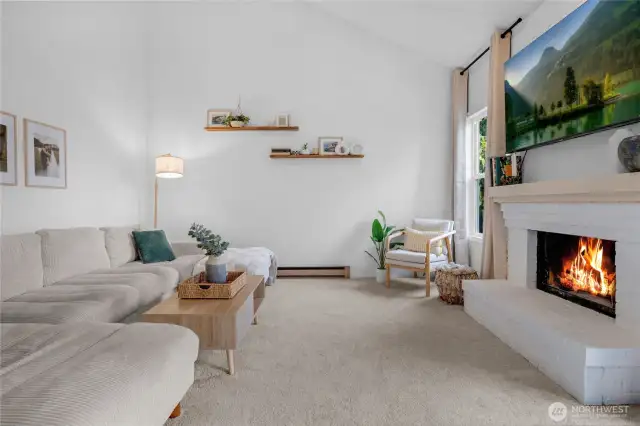 Large open living room with wood fireplace