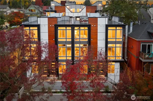 Mature trees in the front help with privacy and scenic views.