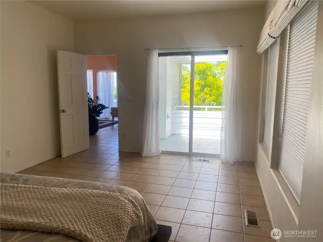 PRIMARY BEDROOM WITH PRIVATE DECK