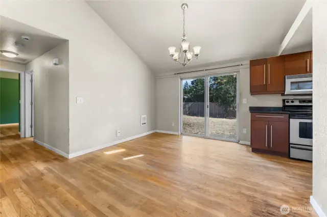 Dining area with sliding doors to fully fenced yard