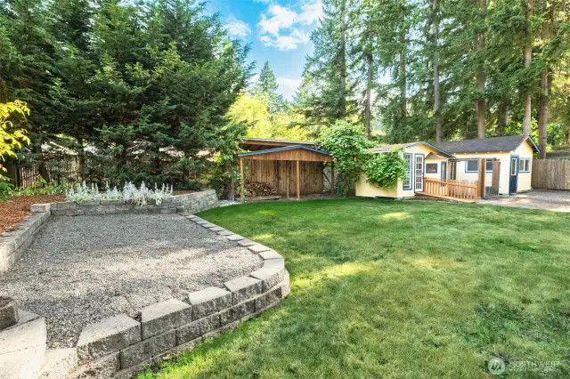 Backyard with woodshed, chicken-coup, and workshop
