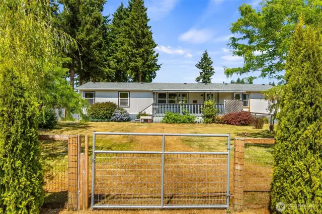 Large gate from exterior yard into the interior yard.