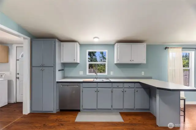 Another view of the kitchen with the laundry room to your left (Washer & Dryer Included)