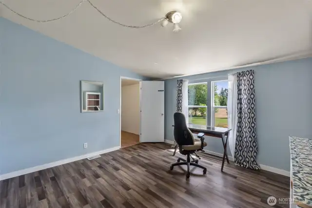 Bedroom #2 with LVP flooring and large walk in closet.