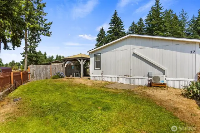 Rear side yard of home.