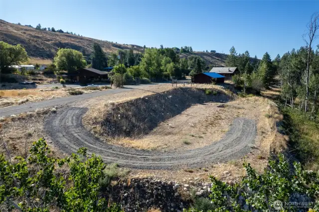 Just under one acre with sunny, level land and easy access year-round.