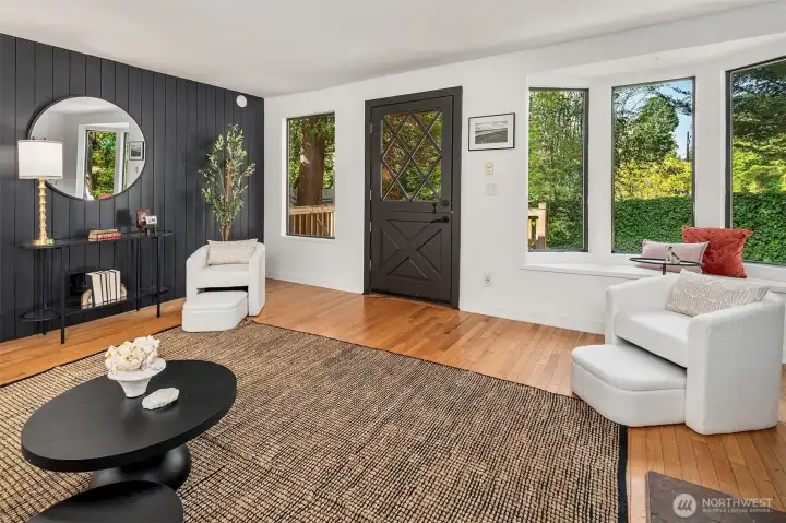 Another view of the lovely living room showing the entry door.