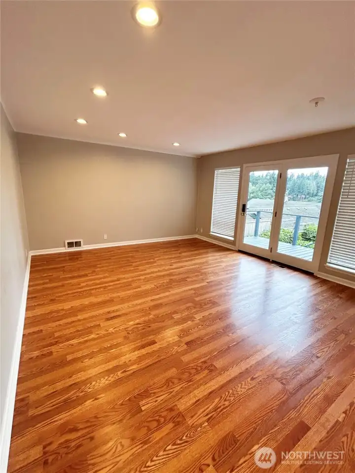 Great room right opens to kitchen with amazing lake views
