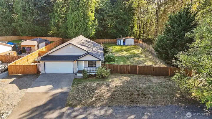 Property is surrounded by green space to the right and the back of property.  Tons of privacy.