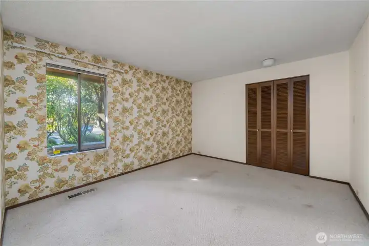 Bedroom 2, located near the front entrance.