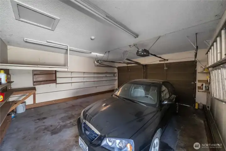 Plenty of room for 2 vehicles and work bench area.