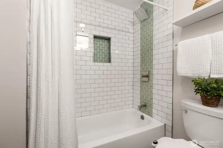 Updated full bathroom with tiled shower