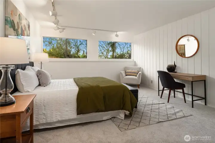 Heading downstairs to the daylight basement this is the third bedroom with great ceiling height, new carpet and new paint.