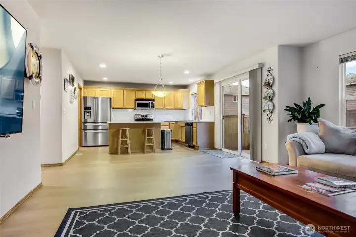 Kitchen and informal eating space adjacent to family room