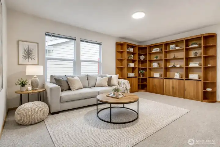 Virtually staged. Built-in shelves offer tons of storage and even a desk option