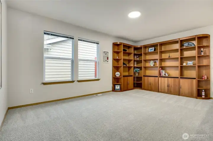 Built-in shelves offer tons of storage and even a desk option