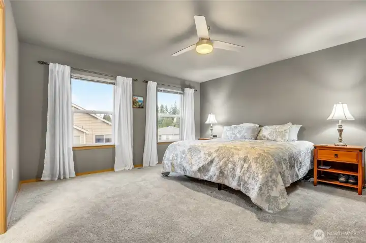 Primary bedroom has two walk-in closets (one not pictured)