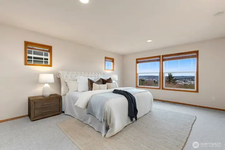 Primary bedroom offers a relaxing space to unwind.